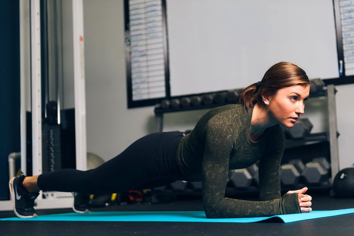STEP 02 for Upper Body Resistance Band Workout for Strength, Posture, and Muscle Tone: Standing Overhead Shoulder Press